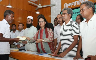 লালপুরে ৪৬ মন্দিরে জিআর চালের ডিও প্রদান